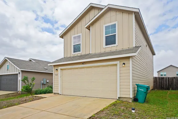 a view of front of house with garage