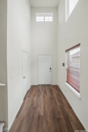 a view of a room that has a window in it