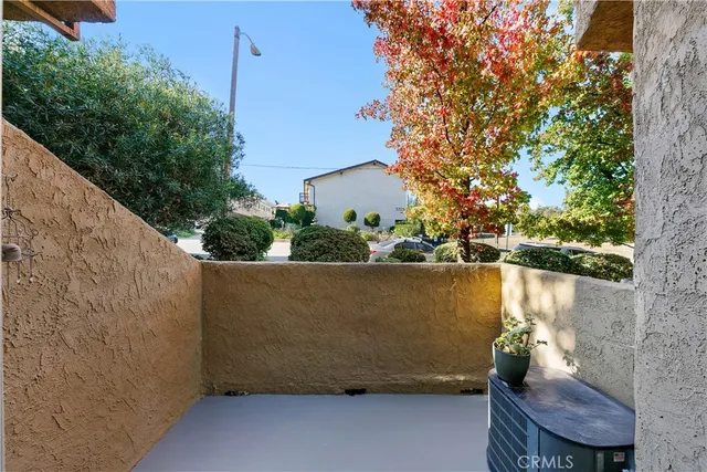 a view of balcony and a yard