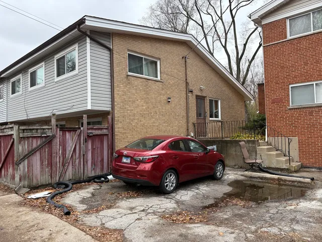a view of a street with cars on road