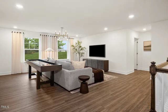 a bedroom with bed and a window