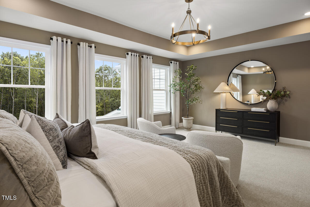 49 Alden Way Angier, NC 27501 - Photo 19 of 66 a bedroom with bed and a window