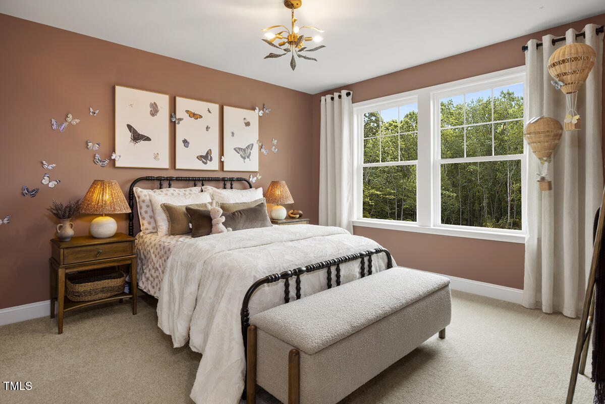 49 Alden Way Angier, NC 27501 - Photo 22 of 66 a bedroom with a bed and a window