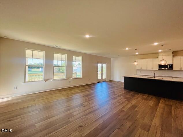 49 Alden Way Angier, NC 27501 - Photo 29 of 66 a view of kitchen with a sink and wooden floor