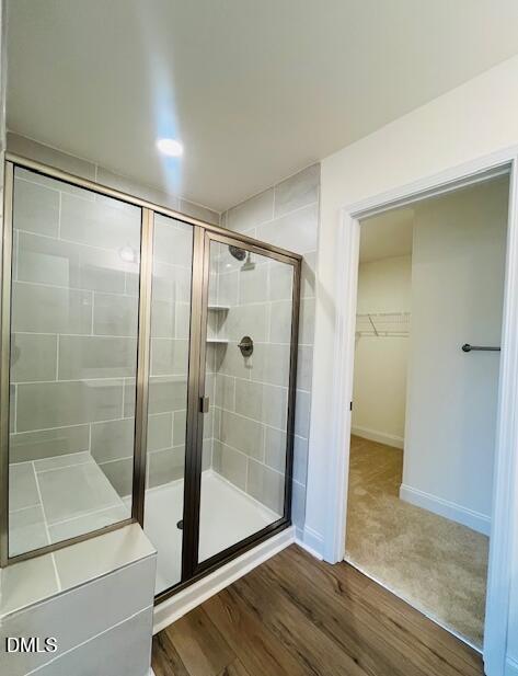 49 Alden Way Angier, NC 27501 - Photo 42 of 66 a bathroom with a glass shower door