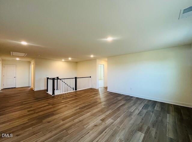 49 Alden Way Angier, NC 27501 - Photo 46 of 66 a view of empty room with wooden floor