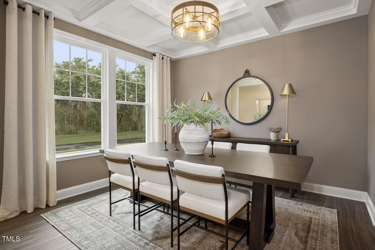 49 Alden Way Angier, NC 27501 - Photo 5 of 66 a view of a dining room with furniture window and wooden floor