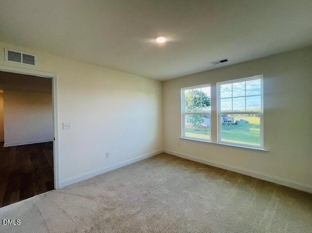 49 Alden Way Angier, NC 27501 - Photo 53 of 66 an empty room with a window