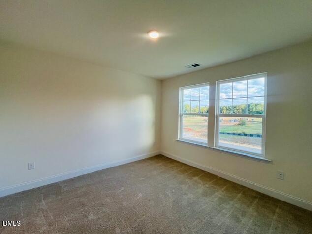 49 Alden Way Angier, NC 27501 - Photo 58 of 66 an empty room with a window
