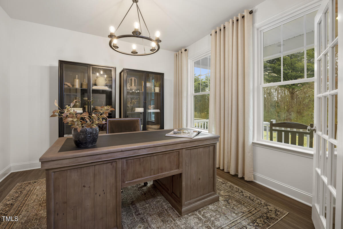 49 Alden Way Angier, NC 27501 - Photo 6 of 66 a room with a large window and chandelier