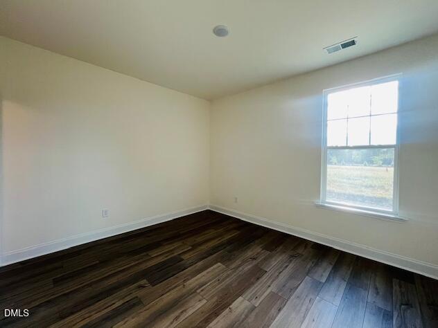 49 Alden Way Angier, NC 27501 - Photo 64 of 66 a room with wooden floor and windows