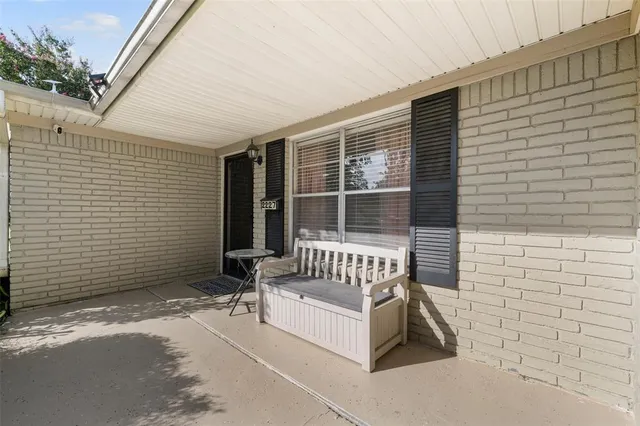 a view of a chair with a table and chair