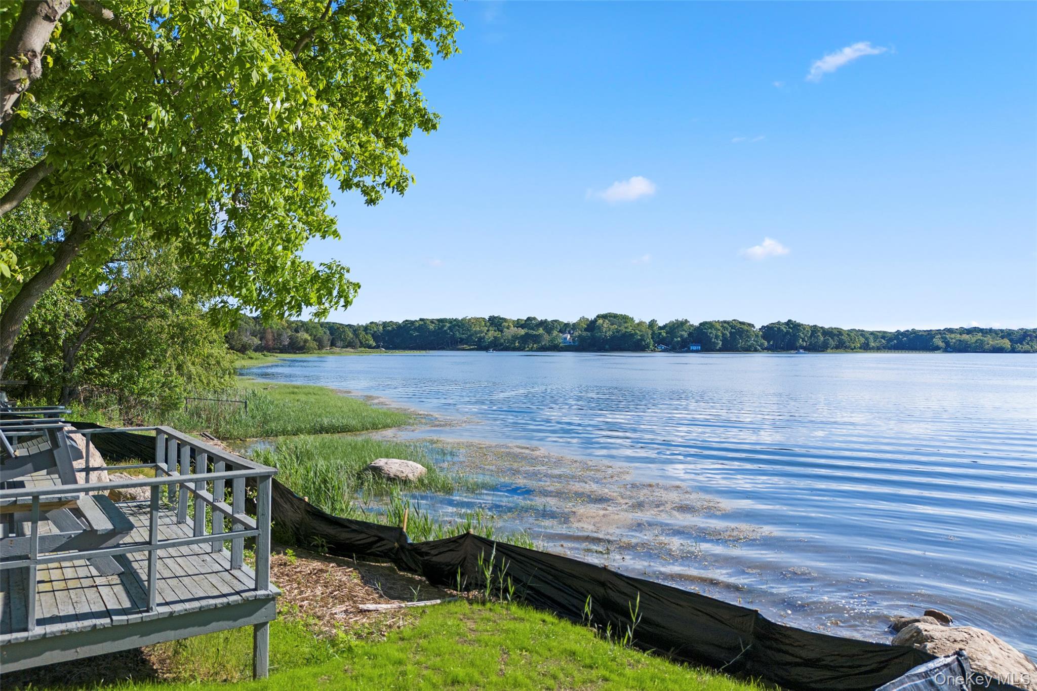 7 Gun Path Setauket, NY 11733 - Photo 34 of 34 a view of a lake with a outdoor space