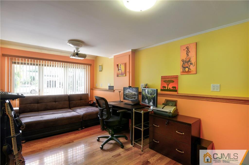 221 North Hill Road Colonia, NJ 07067 - Photo 13 of 25 a view of a workspace with furniture and a window