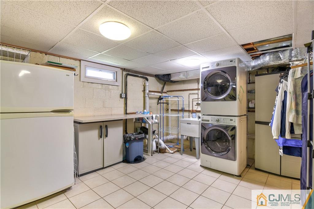 221 North Hill Road Colonia, NJ 07067 - Photo 16 of 25 a utility room with dryer and washer