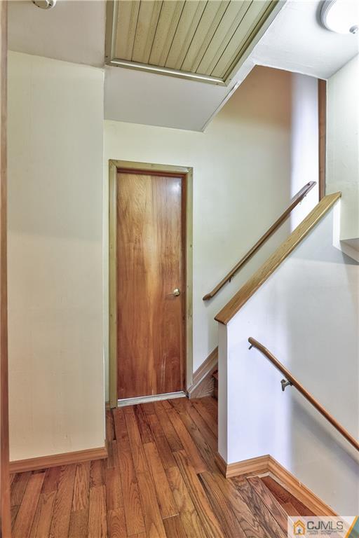 221 North Hill Road Colonia, NJ 07067 - Photo 10 of 25 a view of front door with wooden floor