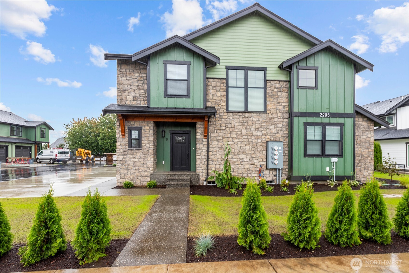 a front view of a house with swimming pool