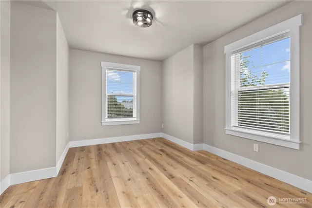 a view of a room that has a window in it