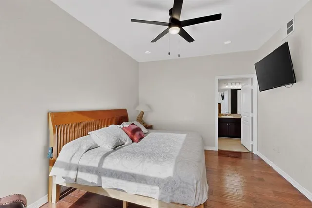 a bed room with bed and window