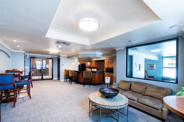a kitchen with stainless steel appliances a sink and cabinets