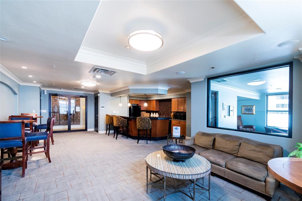 330 Las Colinas Boulevard East, Unit 1116 Irving, TX 75039 - Photo 25 of 36 a living room with furniture and a dining table