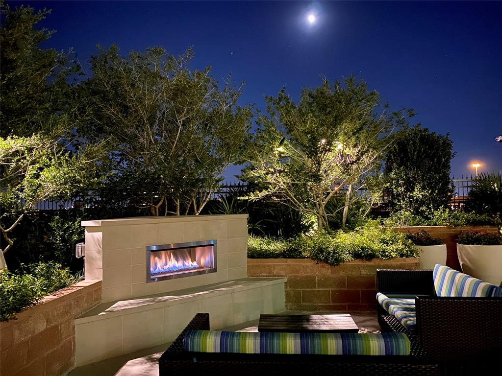 330 Las Colinas Boulevard East, Unit 1116 Irving, TX 75039 - Photo 35 of 36 a view of a patio with chairs and a potted plant