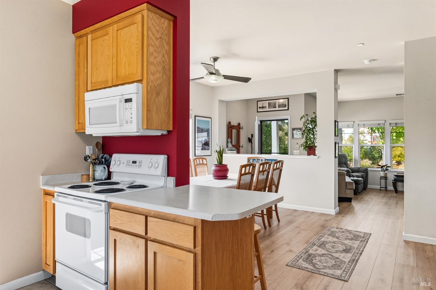 1724 Palomino Court Healdsburg, CA 95448 - Photo 11 of 30 a kitchen with sink cabinets and dining table