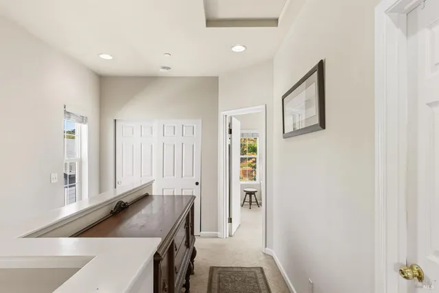a kitchen with a sink and a refrigerator