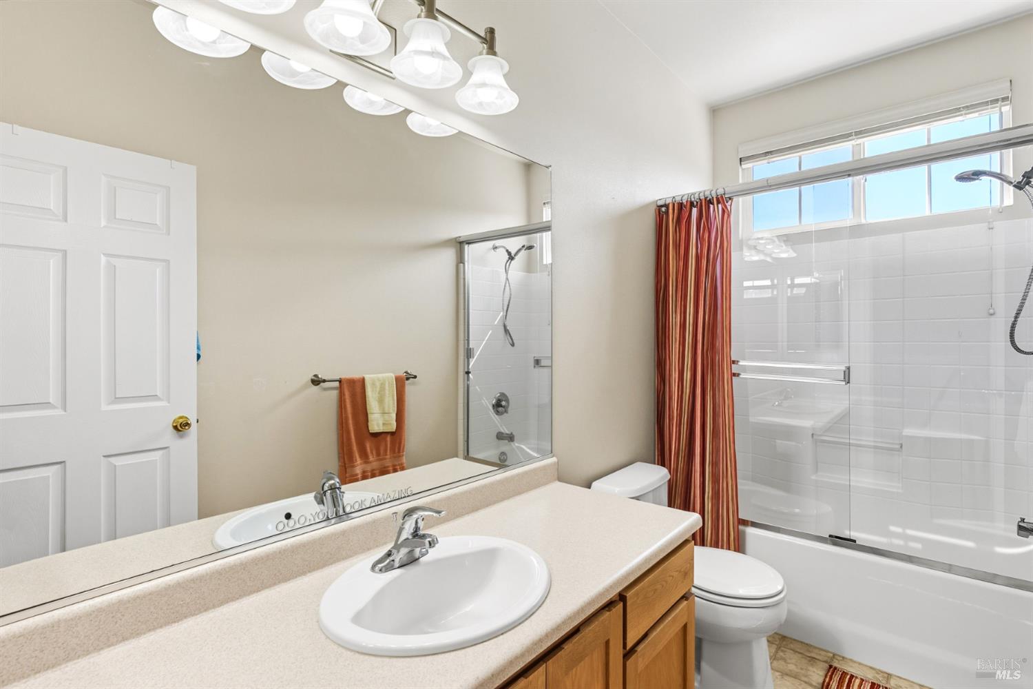 1724 Palomino Court Healdsburg, CA 95448 - Photo 18 of 30 a bathroom with a sink a toilet and shower