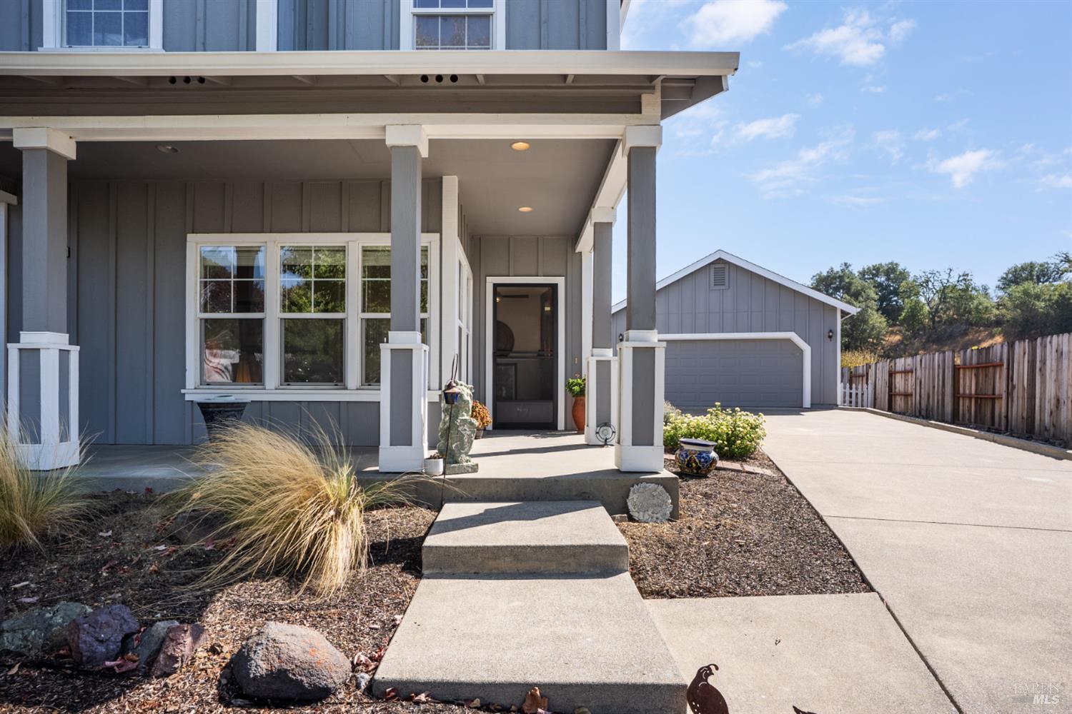 1724 Palomino Court Healdsburg, CA 95448 - Photo 2 of 30 a view of a house with potted plants and wooden floor