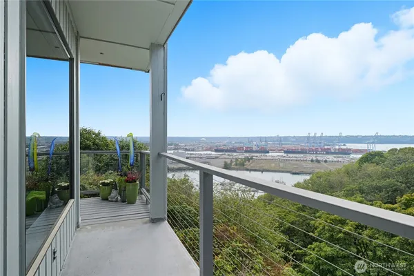 a view of a balcony with city view