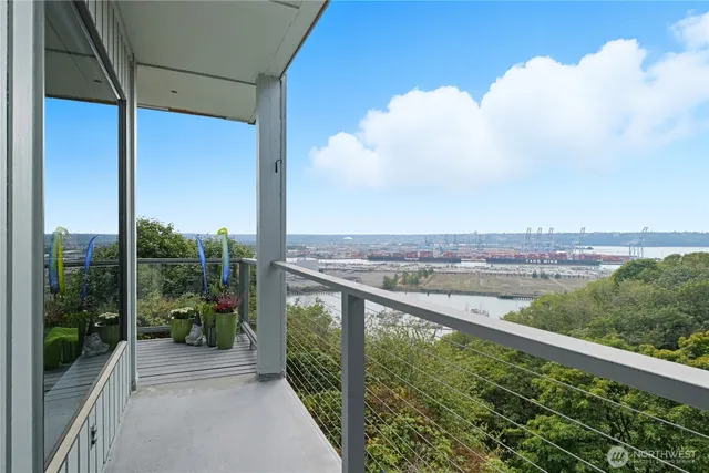 a view of a balcony with city view