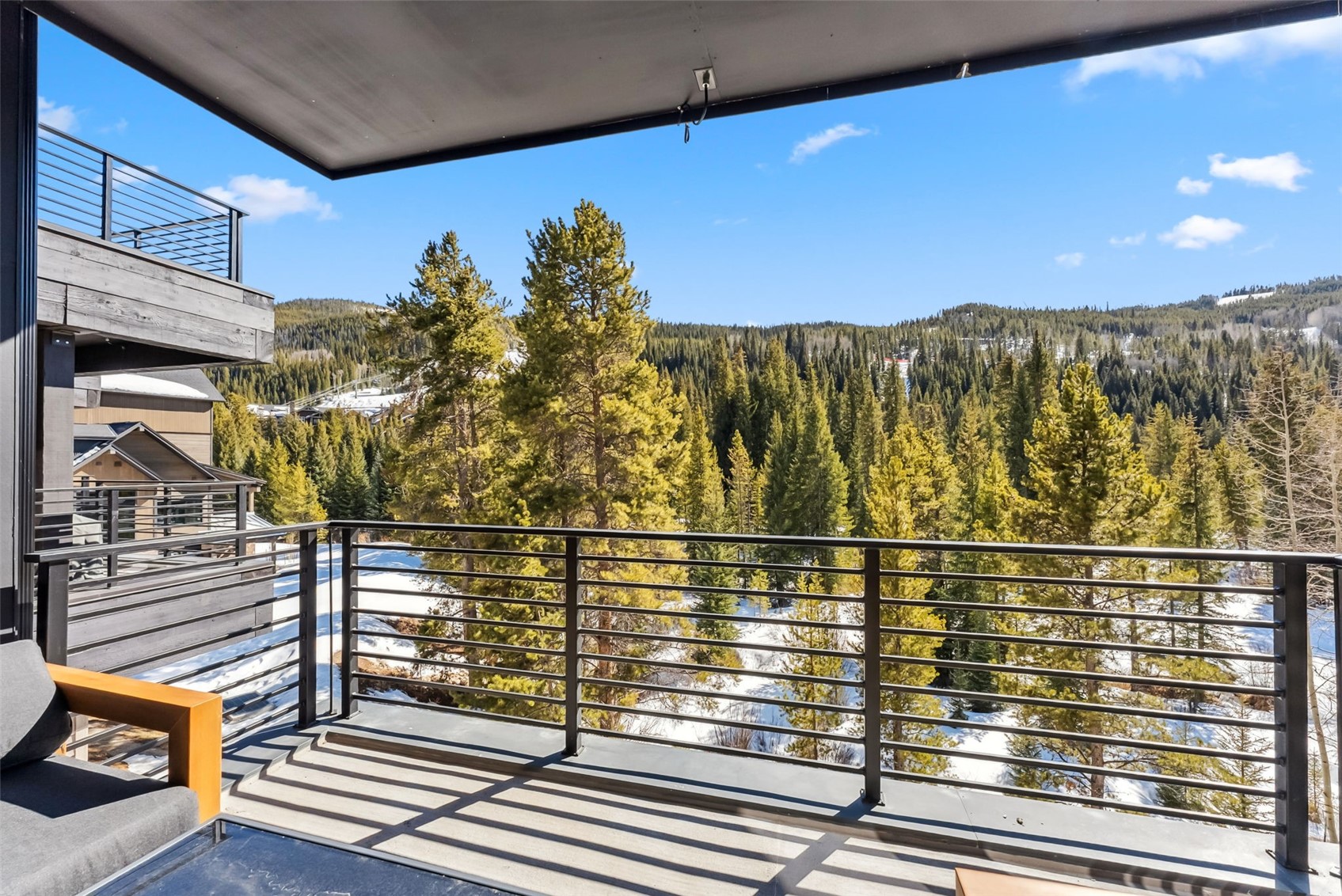 96 River Run Road, Unit A Keystone, CO 80435 - Photo 40 of 50 a view of a balcony with a potted plant
