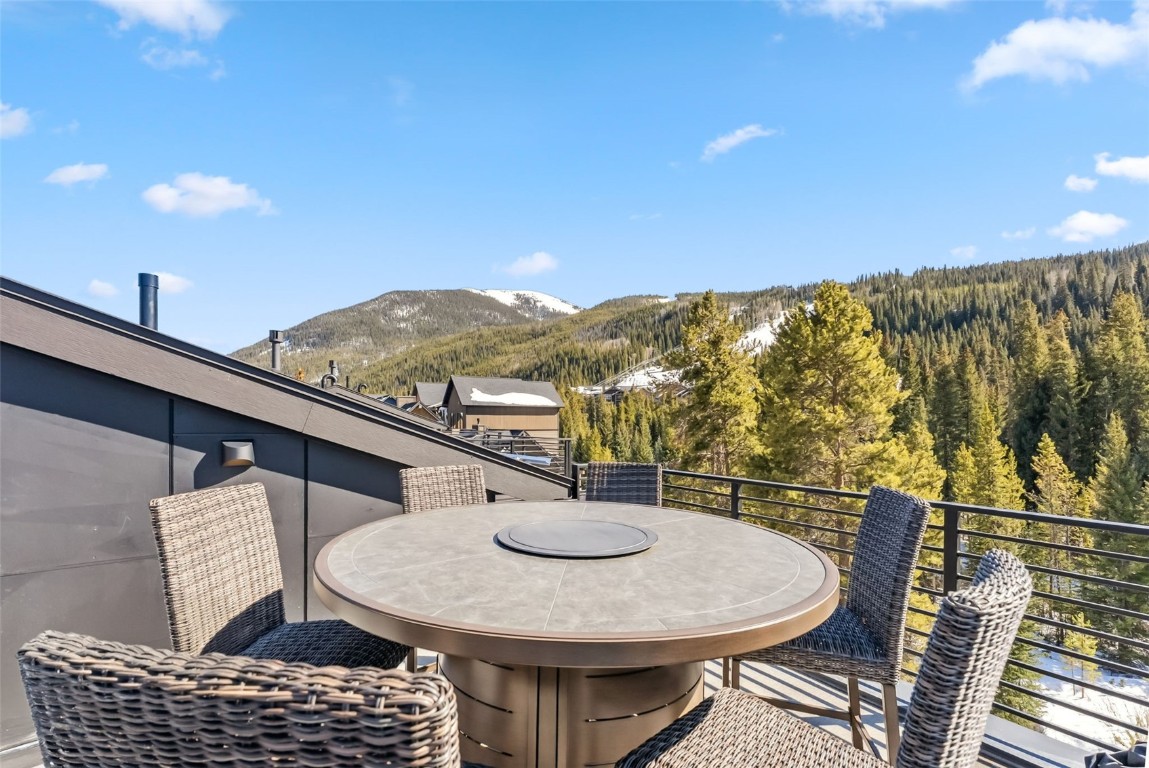 96 River Run Road, Unit A Keystone, CO 80435 - Photo 41 of 50 a terrace of a house with outdoor seating