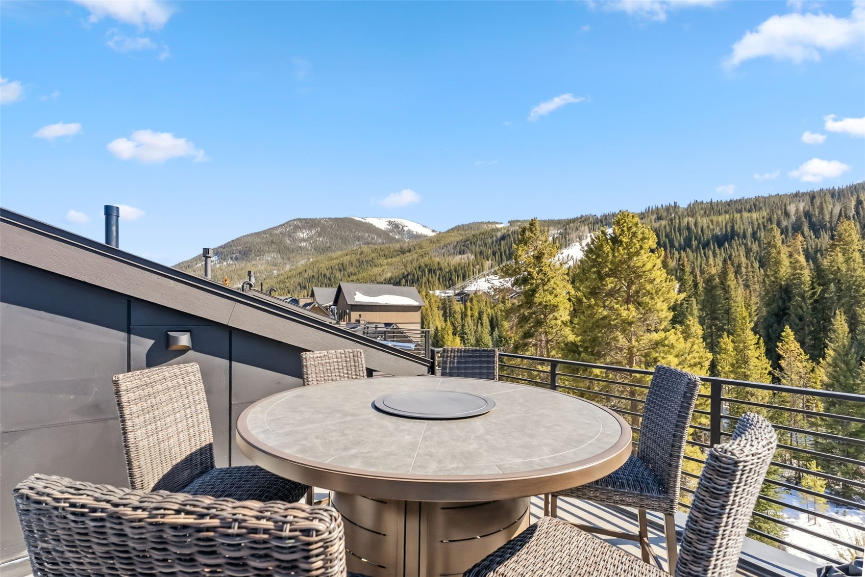96 River Run Road, Unit A Keystone, CO 80435 - Photo 41 of 50 a terrace of a house with outdoor seating