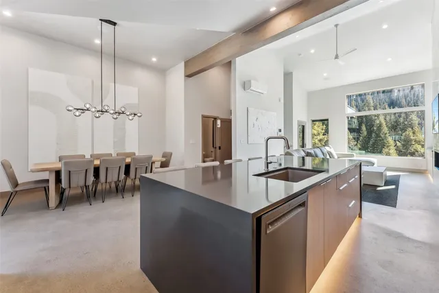 a kitchen with counter top space appliances and a sink