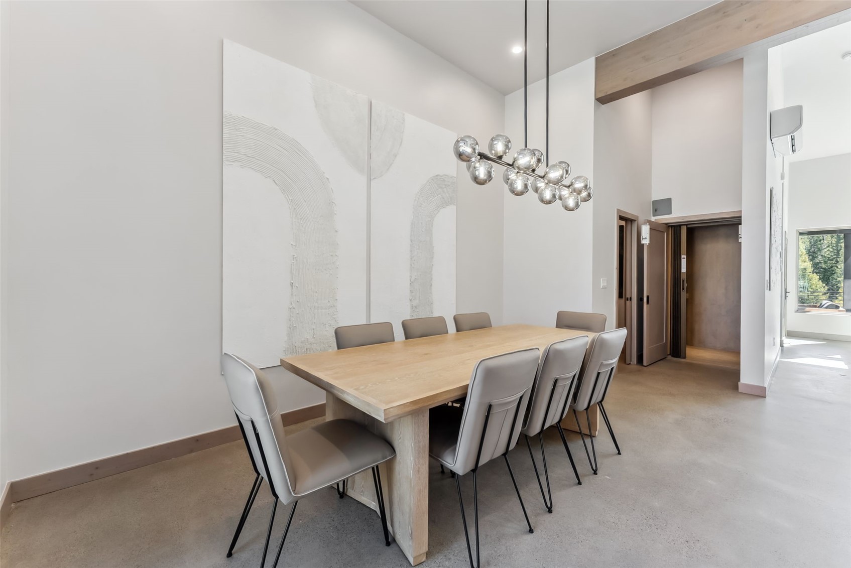96 River Run Road, Unit A Keystone, CO 80435 - Photo 9 of 50 a view of a dining room with furniture and chandelier