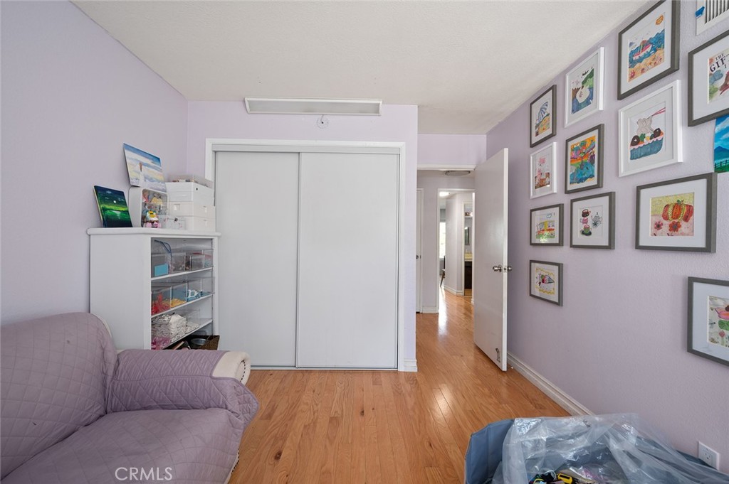 15241 Lille Circle Irvine, CA 92604 - Photo 12 of 38 a living room with furniture and a wooden floor
