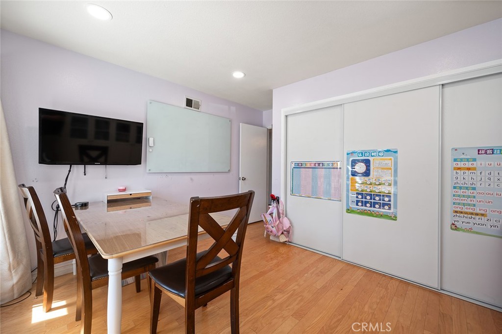 15241 Lille Circle Irvine, CA 92604 - Photo 14 of 38 a view of a livingroom with furniture and a flat screen tv