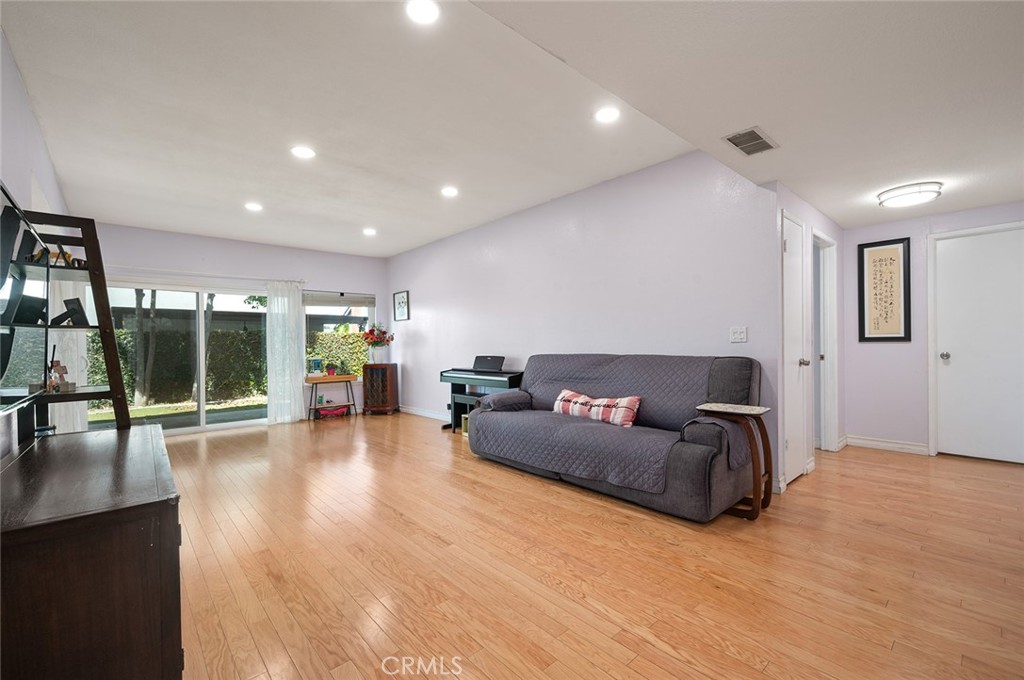 15241 Lille Circle Irvine, CA 92604 - Photo 2 of 38 a living room with furniture and a large window