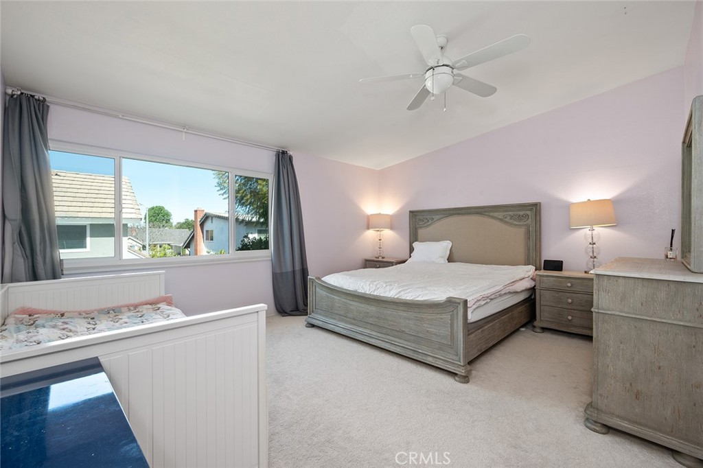 15241 Lille Circle Irvine, CA 92604 - Photo 29 of 38 a bedroom with a large bed and a window