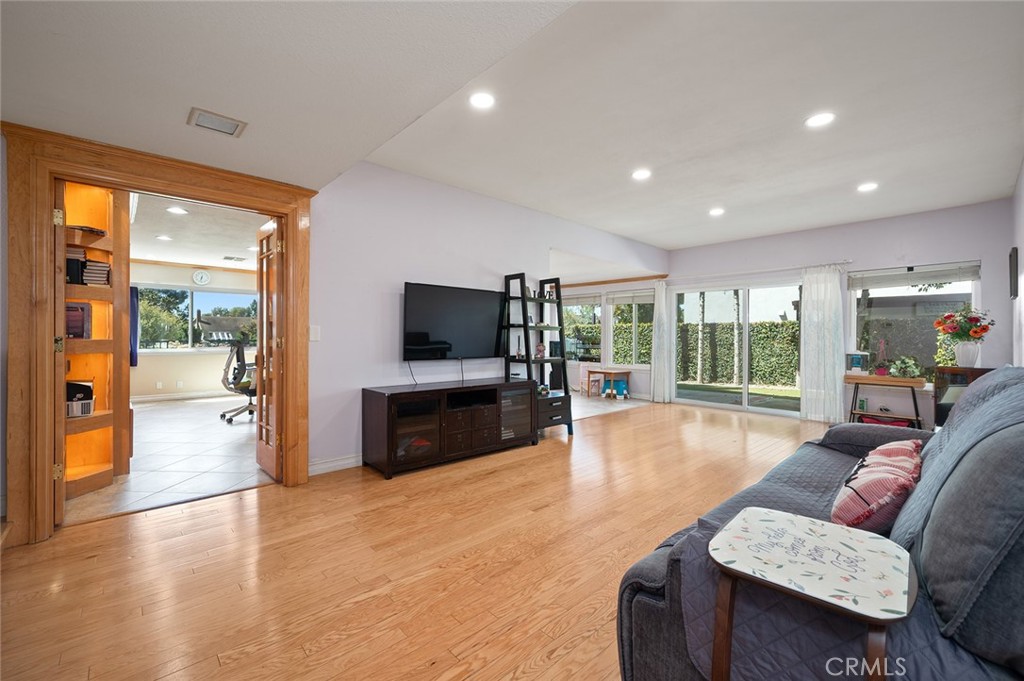 15241 Lille Circle Irvine, CA 92604 - Photo 3 of 38 a living room with furniture and a flat screen tv