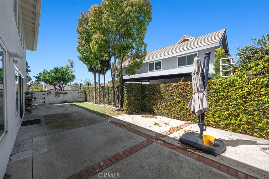 15241 Lille Circle Irvine, CA 92604 - Photo 32 of 38 a front view of a house with a yard