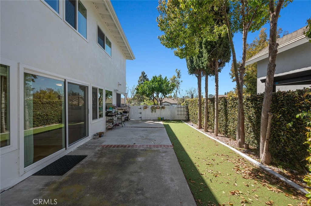 15241 Lille Circle Irvine, CA 92604 - Photo 33 of 38 a view of a house with backyard and sitting area