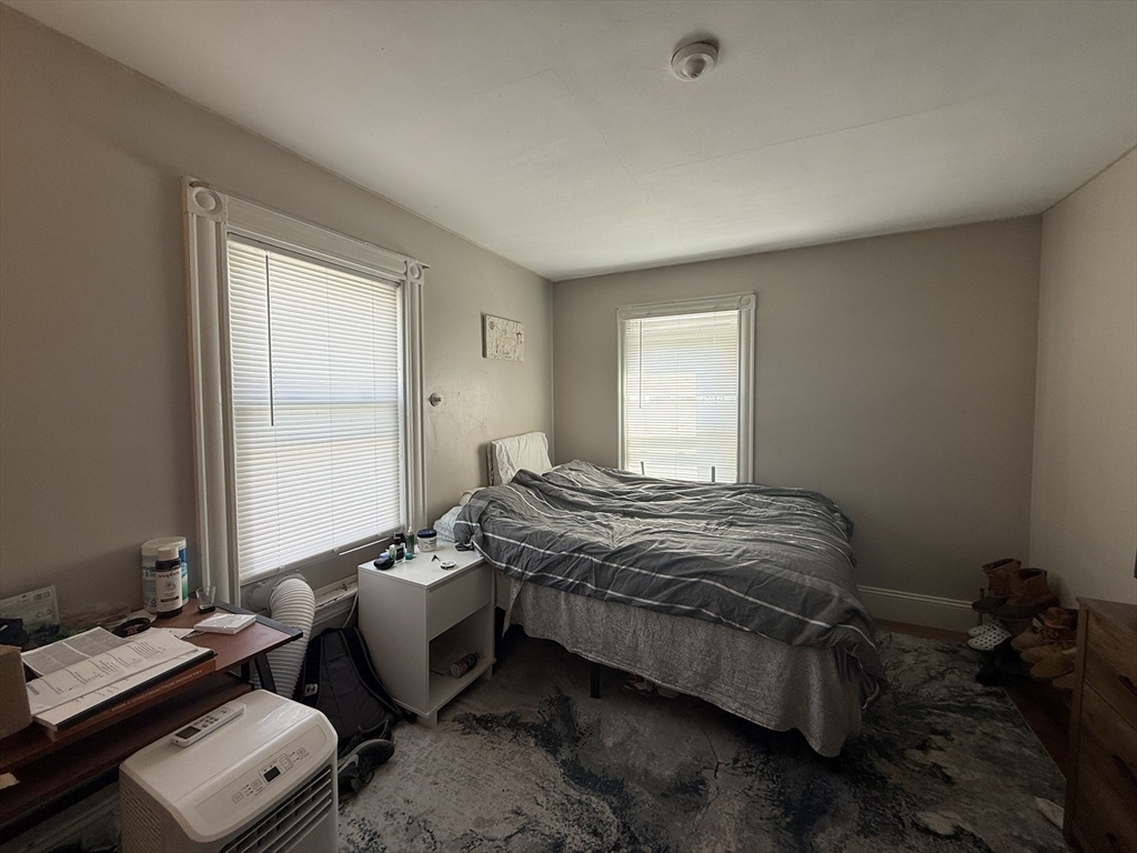 4 Barstow Street Boston, MA 02134 - Photo 14 of 21 a bedroom with bed and window