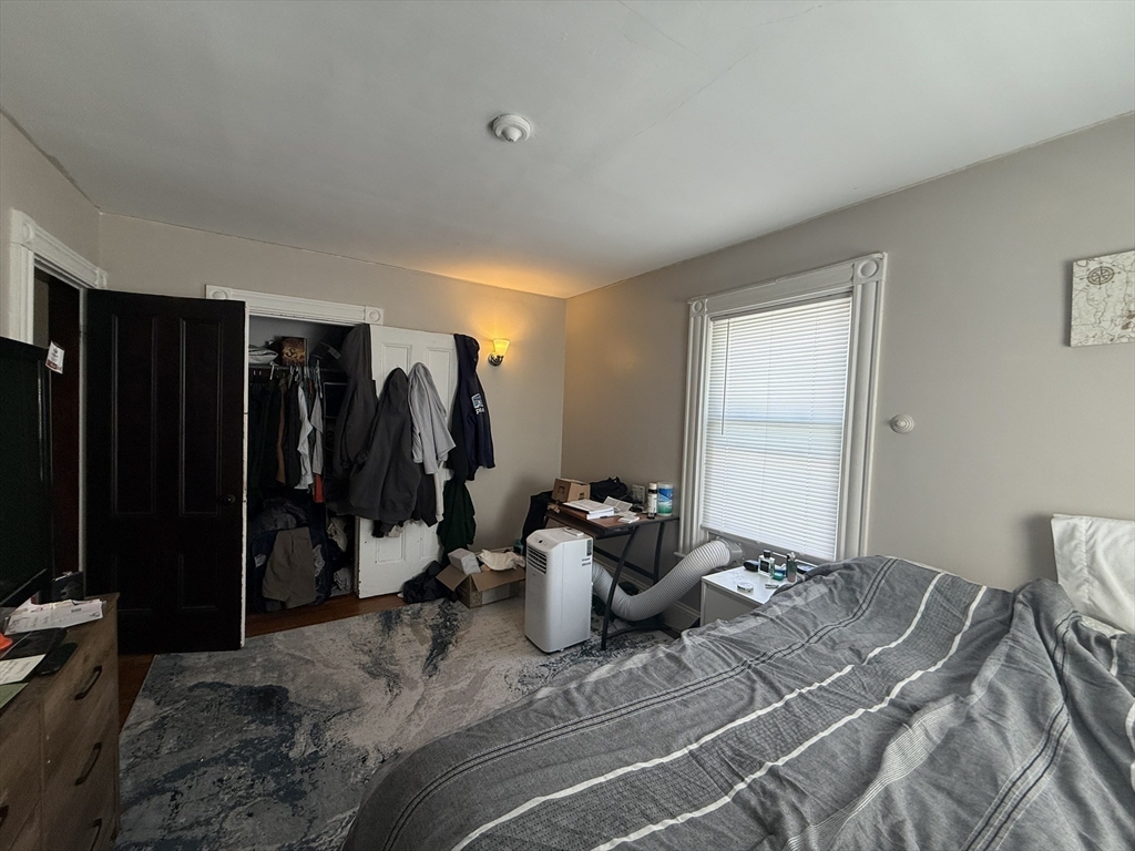 4 Barstow Street Boston, MA 02134 - Photo 16 of 21 a room with two chair and a large window