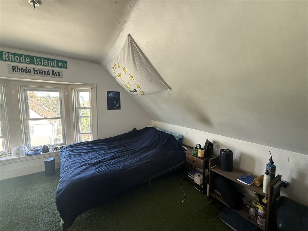 4 Barstow Street Boston, MA 02134 - Photo 18 of 21 a room with a bed and windows