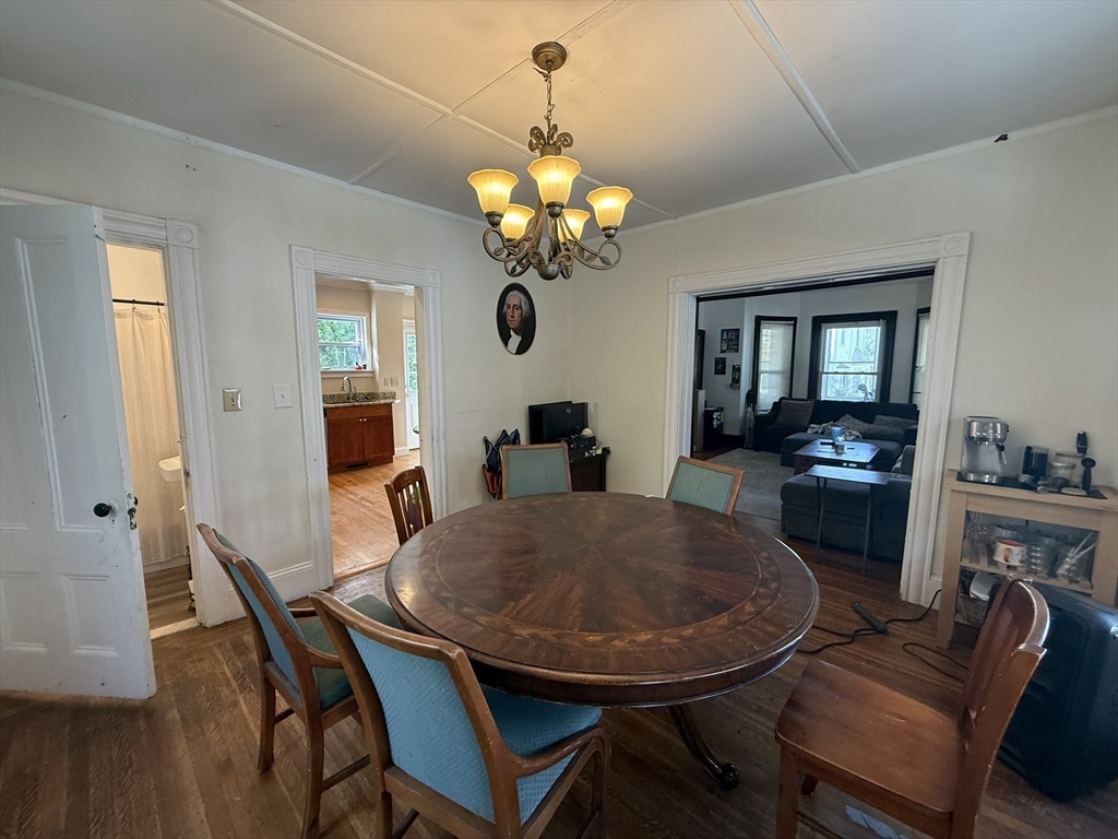 4 Barstow Street Boston, MA 02134 - Photo 6 of 21 a view of a dining room with furniture and wooden floor