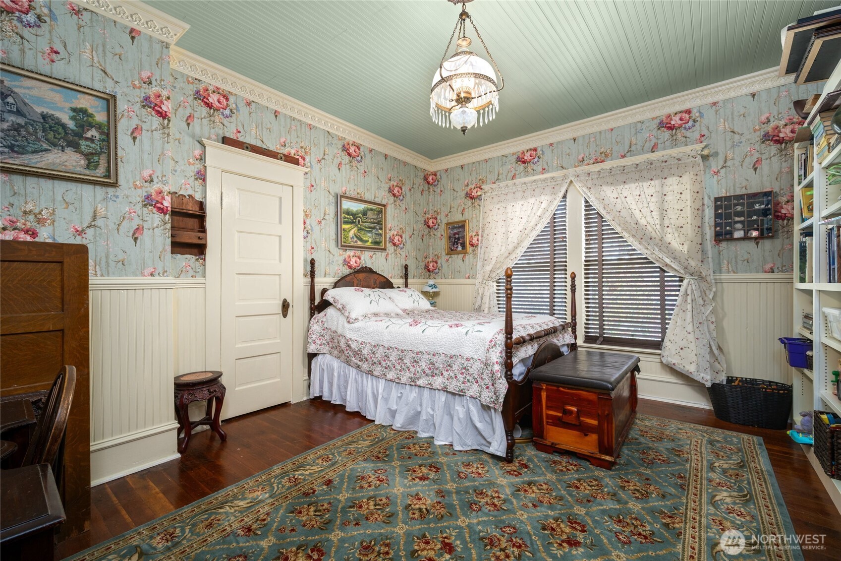 1507 15th Street Anacortes, WA 98221 - Photo 15 of 40 a bedroom with furniture and wooden floor