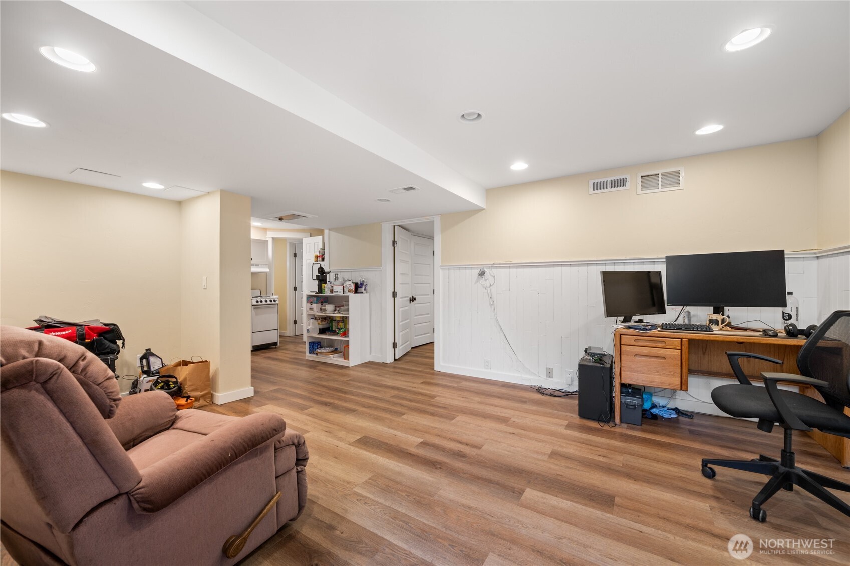 1507 15th Street Anacortes, WA 98221 - Photo 20 of 40 a living room with furniture and a flat screen tv